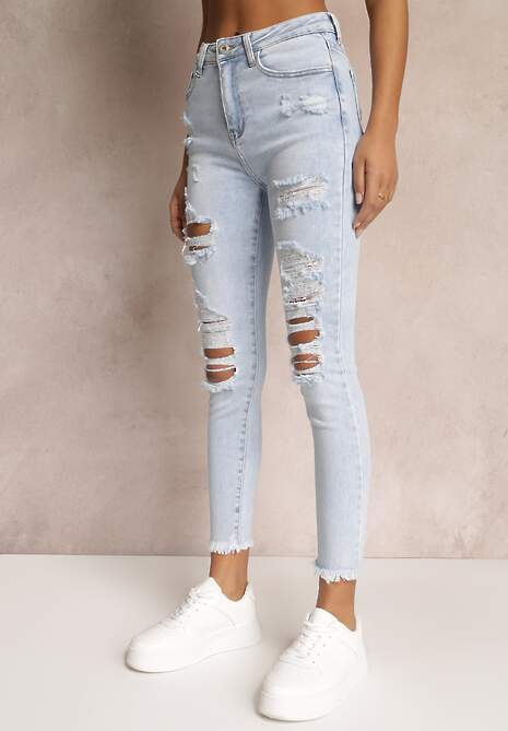 Niebieskie Jeansy Skinny Zdobione Dziurami i Postrzępione na Dole Jaaliyah 4