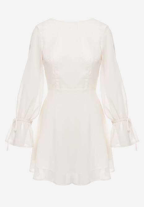 Beżowa Sukienka Vices Ozdobiona Transparentnymi Rękawami i Kropkami Celziva 6