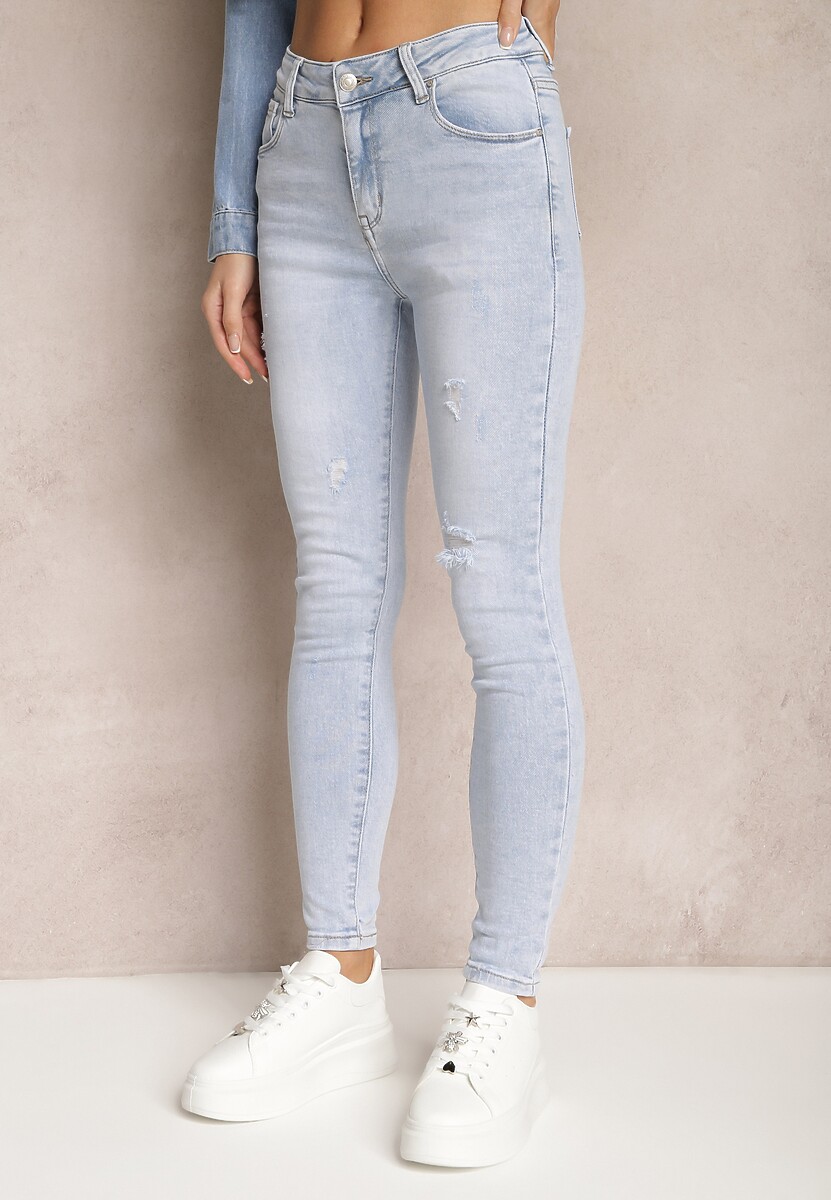 Jasnoniebieskie Jeansy Skinny z Regularną Talią i Przetarciami Semena 1