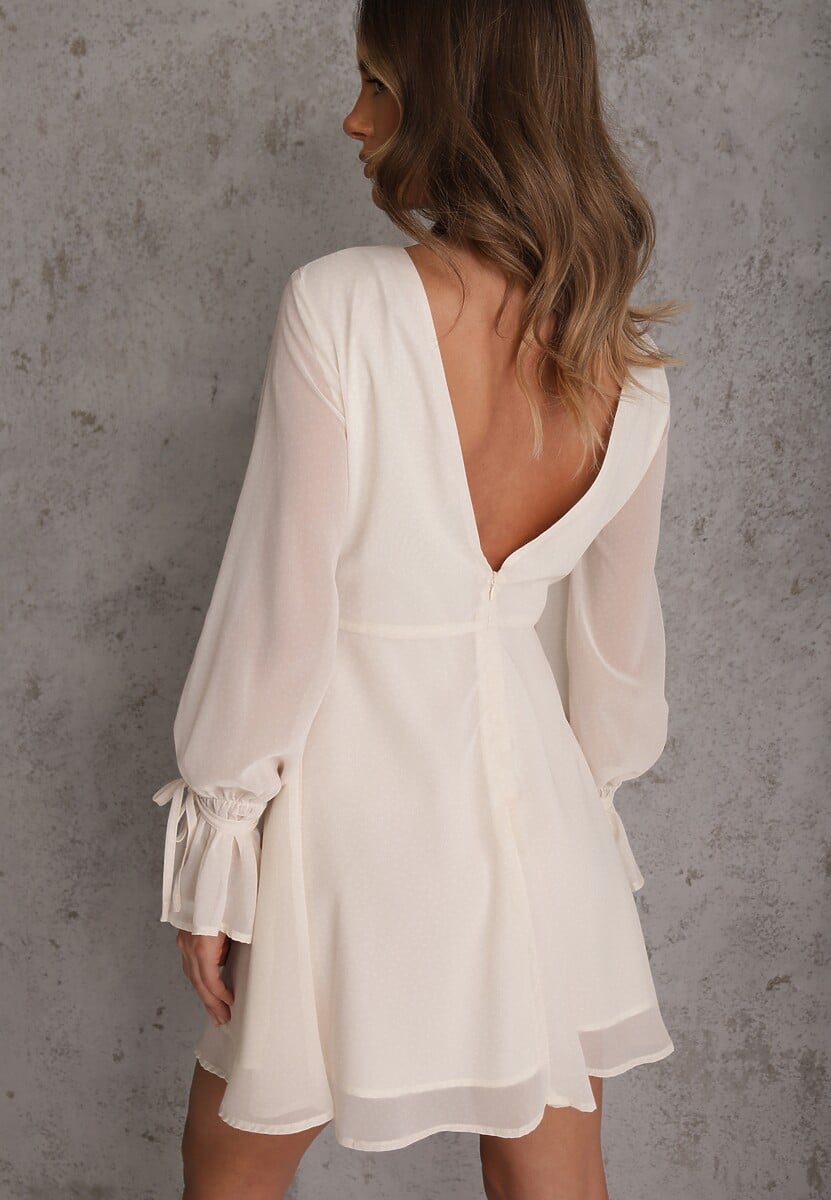 Beżowa Sukienka Vices Ozdobiona Transparentnymi Rękawami i Kropkami Celziva 3