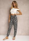 Pantaloni sport negri și albi din viscoză cu talie înaltă și elastic în talie cu imprimeu floral Risalenas