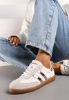 Biało-Złote Sneakersy ze Skóry Naturalnej na Płaskiej Podeszwie Wykończone Paskami Navinda