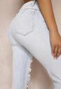 Jasnoniebieskie Jeansy Skinny z Efektem Push Up i Przedarciami Deziya