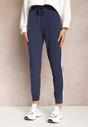 Pantaloni de trening bleumarin cu benzi laterale decorative Heminita cu elastic în talie