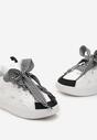 Biało-Czarne Sneakersy z Dekoracyjnym Sznurowaniem i Wstawką na Języku Cristen