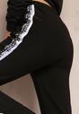Pantaloni sport negri din bumbac cu dungi laterale și imprimeu Sumbala