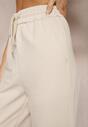 Jasnobeżowe Szerokie Spodnie Dresowe z Elastycznej Bawełny Niarti