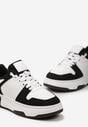 Czarno-Białe Sneakersy Ozdobione Perforacją i Przeszyciami na Platformie Fradania