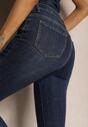 Granatowe Skinny Jeansy ze Sztucznym Futerkiem przy Kostkach Pelle