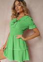 Rochie verde evazată cu elastic în talie și volane decorative la decolteu Arcidia