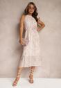 Rochie de seară roz deschis evazată cu decolteu halter și broșă în formă de floare Previiana