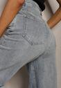 Jasnoniebieskie Jeansy z Bawełny High Waist o Szerokim Kroju Wykończone Dziurami Xeraria