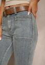 Jasnoniebieskie Jeansy z Bawełny Dzwony High Waist  z Paskiem i Ozdobnymi Kieszeniami Mevalia