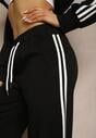 Czarne Spodnie Dresowe Szerokie z Wiskozą Lampasami i Wiązaniem Fenadis