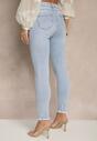 Jasnoniebieskie Jeansy o Fasonie Skinny Push Up Zdobione Przetarciami Salzeri