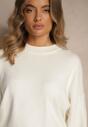 Biały Nietoperzowy Sweter w Minimalistycznym Stylu Raliava