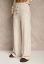 Jasnobeżowe Szerokie Spodnie Dzianinowe Ozdobione Sznurkami Meretusa