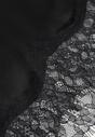 Czarna Asymetryczna Spódnica z Satyny Zdobiona Koronką Katarva