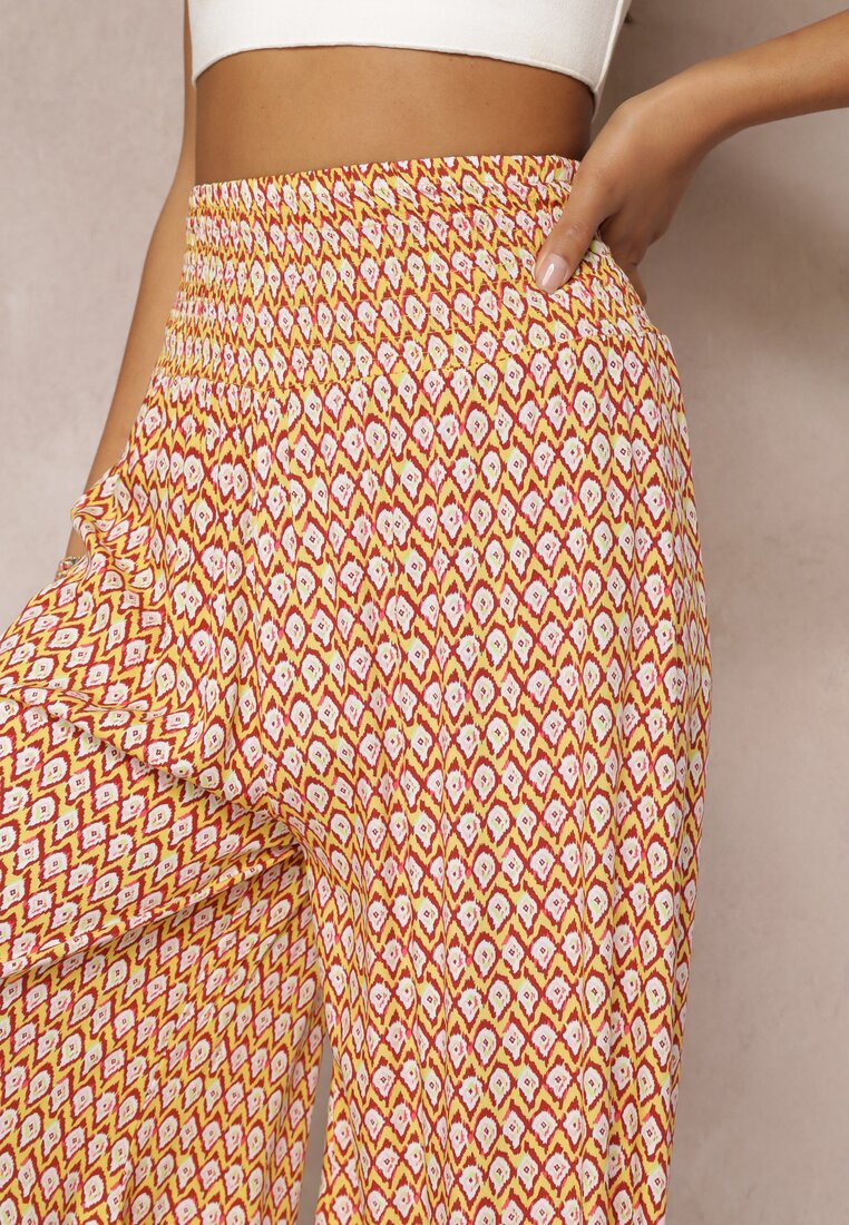 Żółto-Pomarańczowe Szerokie Spodnie z Wiskozy z Marszczoną Gumką w Talii Mellody