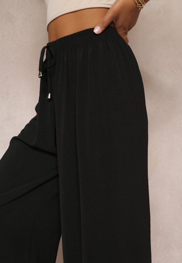 Pantaloni negri cu elastic în talie și picioare largi Seira