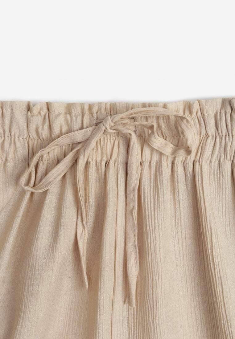Pantaloni largi bej din viscoză cu elastic în talie Abyga