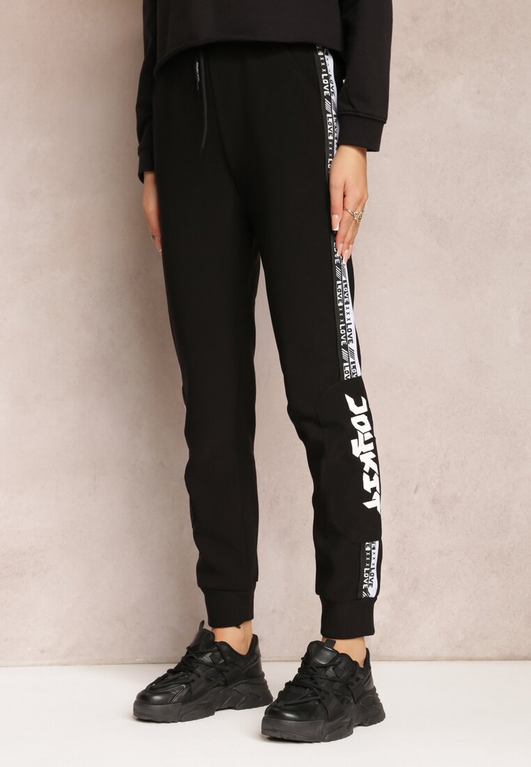 Pantaloni sport negri din bumbac cu dungi laterale și imprimeu Sumbala