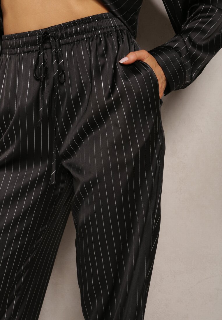 Czarne Szerokie Spodnie z Gumką w Talii i Błyszczącym Wzorem w Paski Zoyama