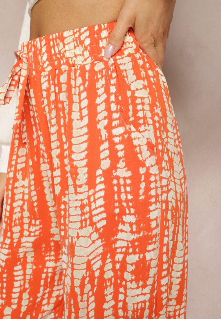 Pomarańczowe Spodnie z Szerokimi Nogawkami z Abstrakcyjnym Wzorem i Gumką w Pasie Sarieta
