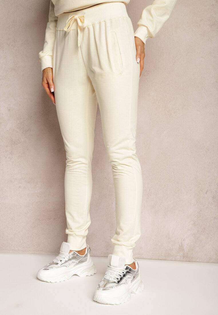 Pantaloni sport bej deschis croi clasic cu elastic în talie Ivemia