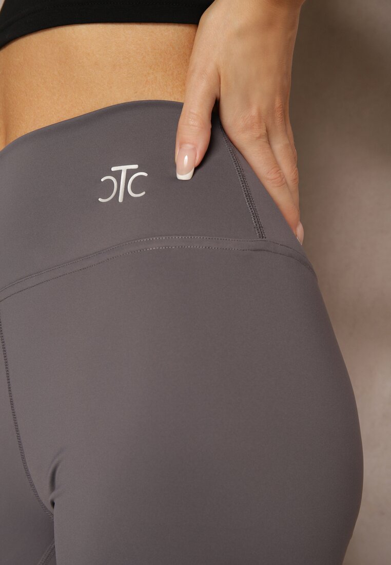Ciemnoszare Sportowe Legginsy High Waist z Małym Ozdobnym Znaczkiem Lerilane