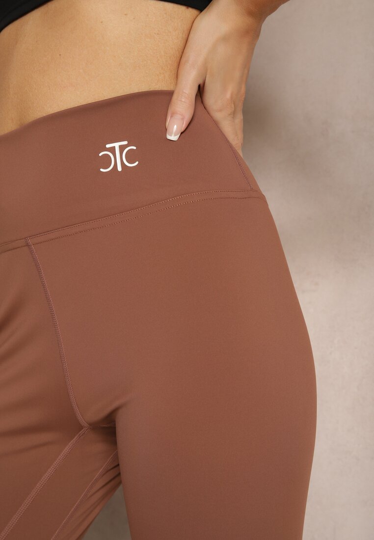 Brązowe Sportowe Legginsy High Waist z Małym Ozdobnym Znaczkiem Lerilane