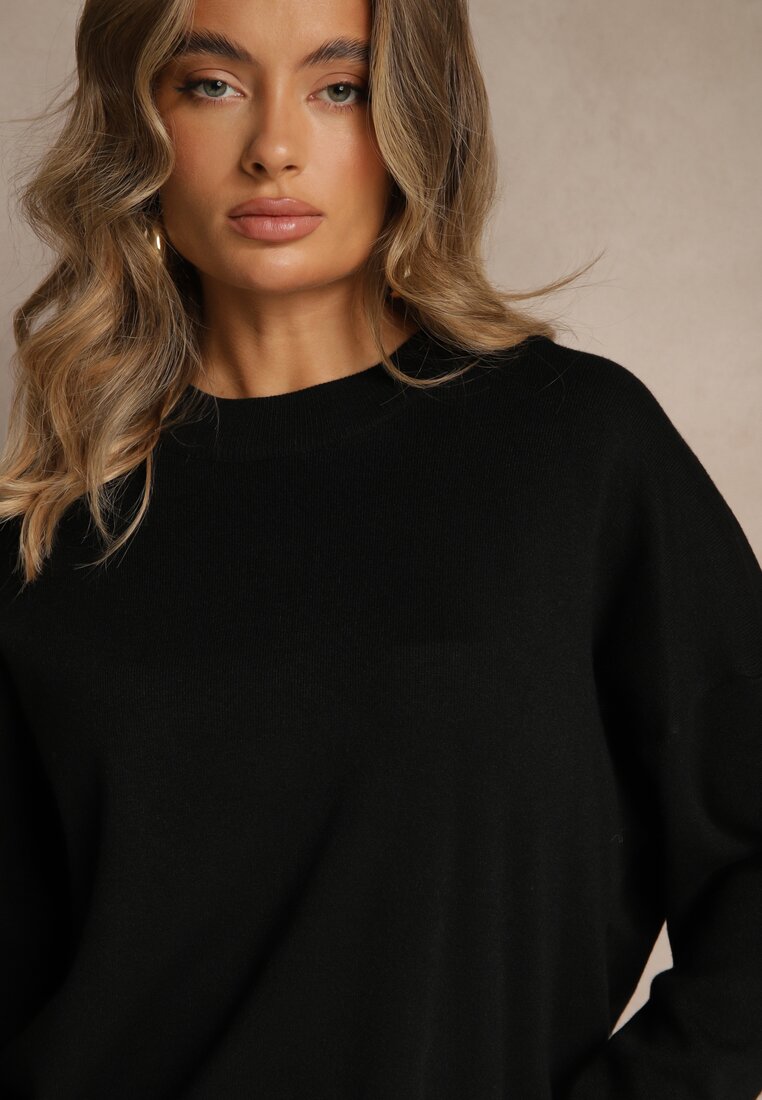 Czarny Nietoperzowy Sweter w Minimalistycznym Stylu Raliava