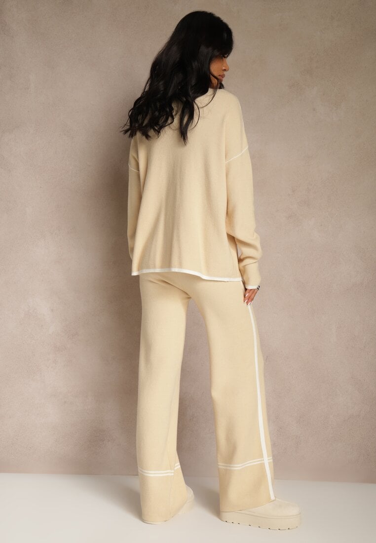 Jasnobeżowy Komplet Dzianinowy Sweter i Spodnie o Szerokim Kroju Ozdobione Lamówką Wedara