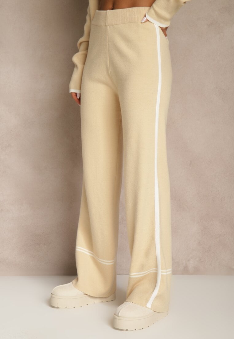 Jasnobeżowy Komplet Dzianinowy Sweter i Spodnie o Szerokim Kroju Ozdobione Lamówką Wedara