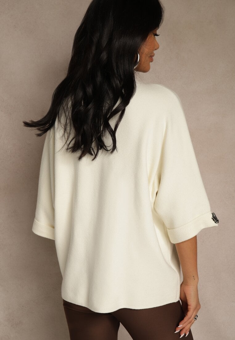 Jasnobeżowy Sweter z Cyrkoniami przy Rękawach Corentusa