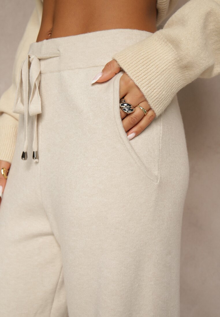 Jasnobeżowe Szerokie Spodnie Dzianinowe Ozdobione Sznurkami Meretusa