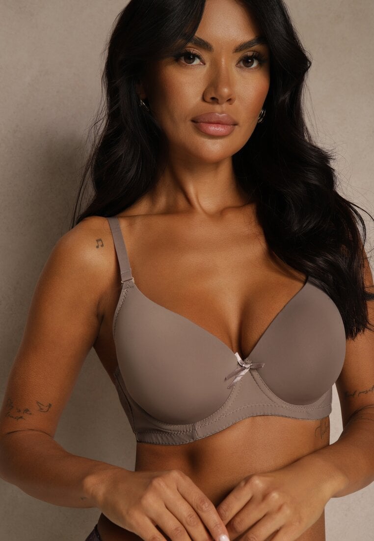 Beżowy Gładki Biustonosz o Klasycznym Fasonie Zdobiony Kokardką Caloris