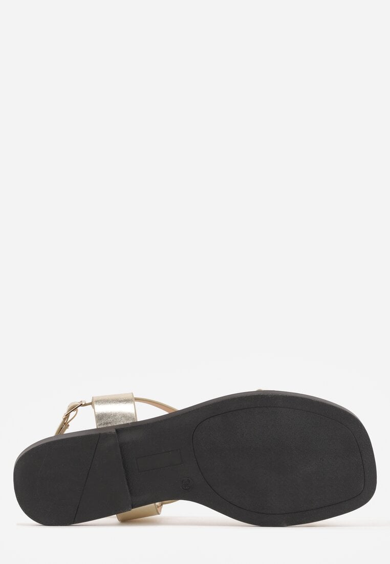 Złote Sandały Typu Japonki Ozdobione Metaliczną Aplikacją Grynyra