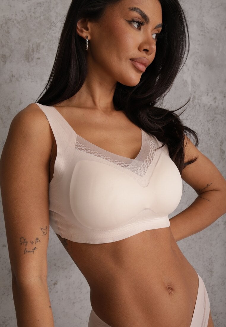 Beżowy Sportowy Biustonosz z Usztywnieniem Ozdobiony Siateczkową Wstawką Edalissa