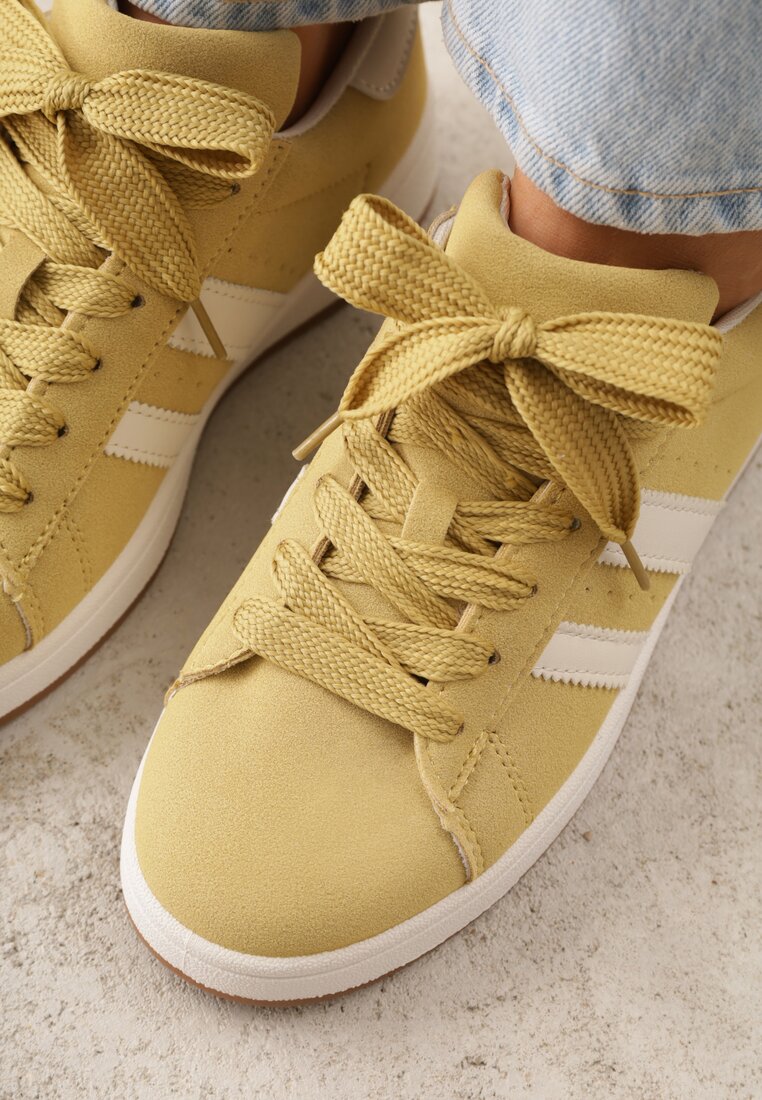 Żółte Sneakersy Ozdobione Paskami Dolirenna