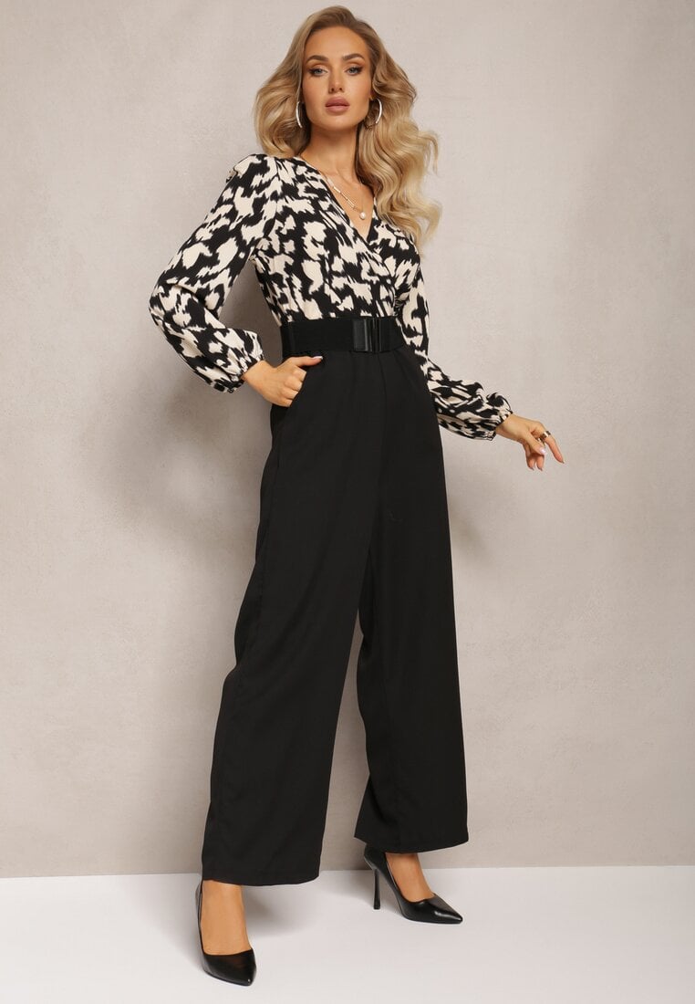 Salopetă Negru-Alb cu Picioare Lungi și Decolteu Petrecut și Curea Elastică Koretta