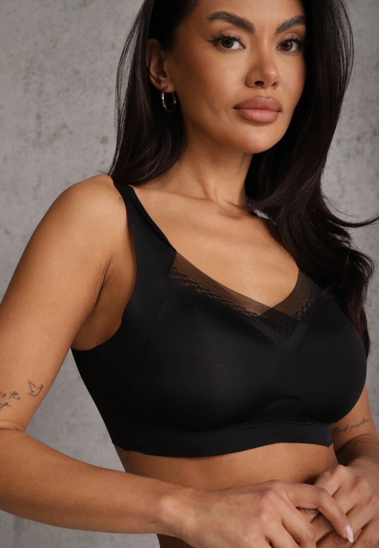 Sutien sportiv negru cu întăritură decorat cu inserție din plasă Edalissa