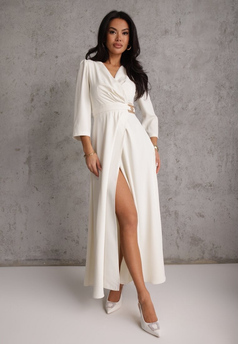 Rochie elegantă bej deschisă cu croială petrecută decorată cu aplicație în talie Zilendra